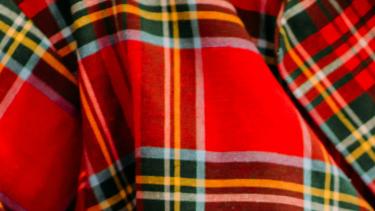 Closeup of red, green, yellow and white plaid flannel