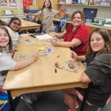 students painting rocks