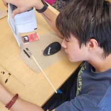 students painting rocks