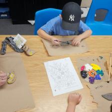students painting rocks