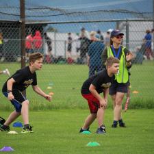 Three boys take their mark in a school sports day